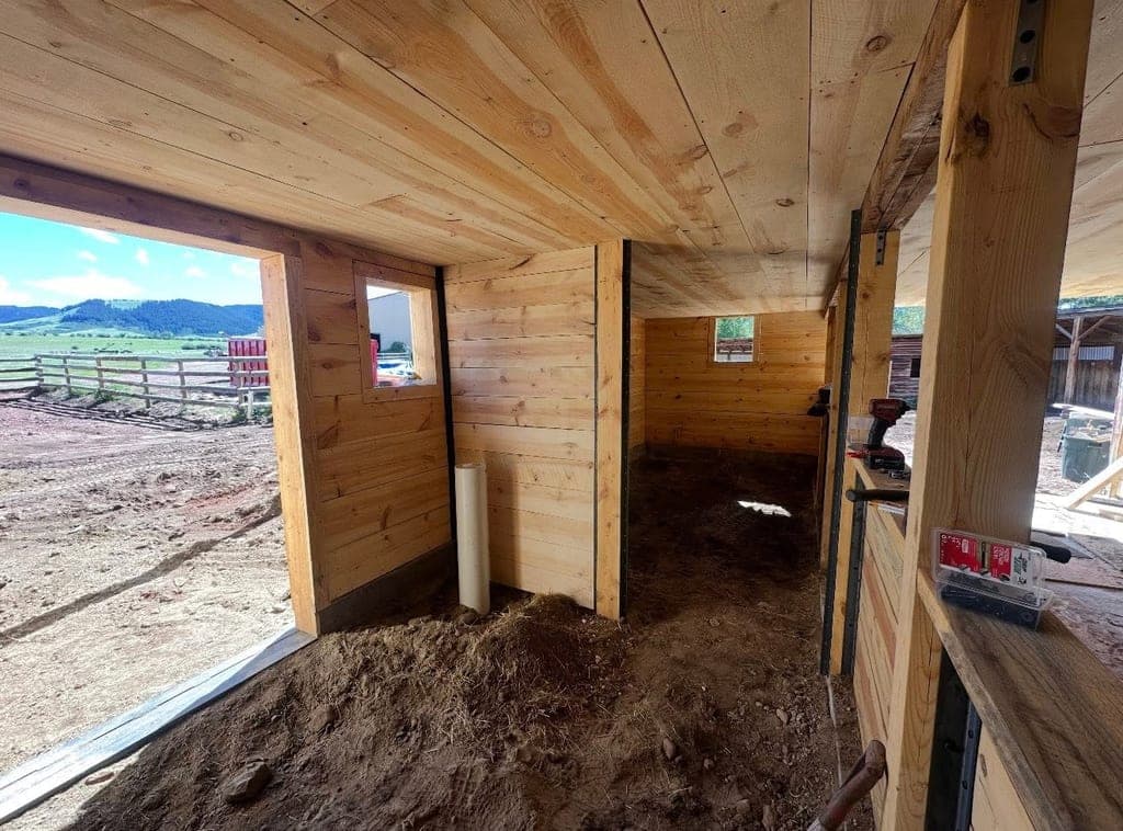 Finished wood-paneled interior of a barn renovation project